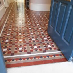 nice geometric tiles cleaned and restored in Hertfordshire. Pic shows shiny Victorian tiles after waxing