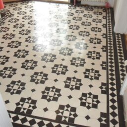 A stunning Tenby tile design installed in a hallway in West London