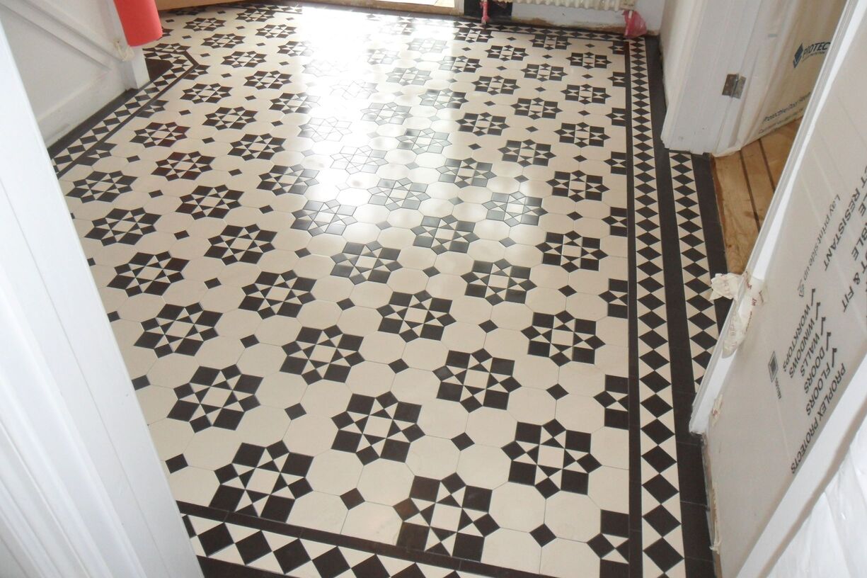 A stunning Tenby tile design installed in a hallway in West London